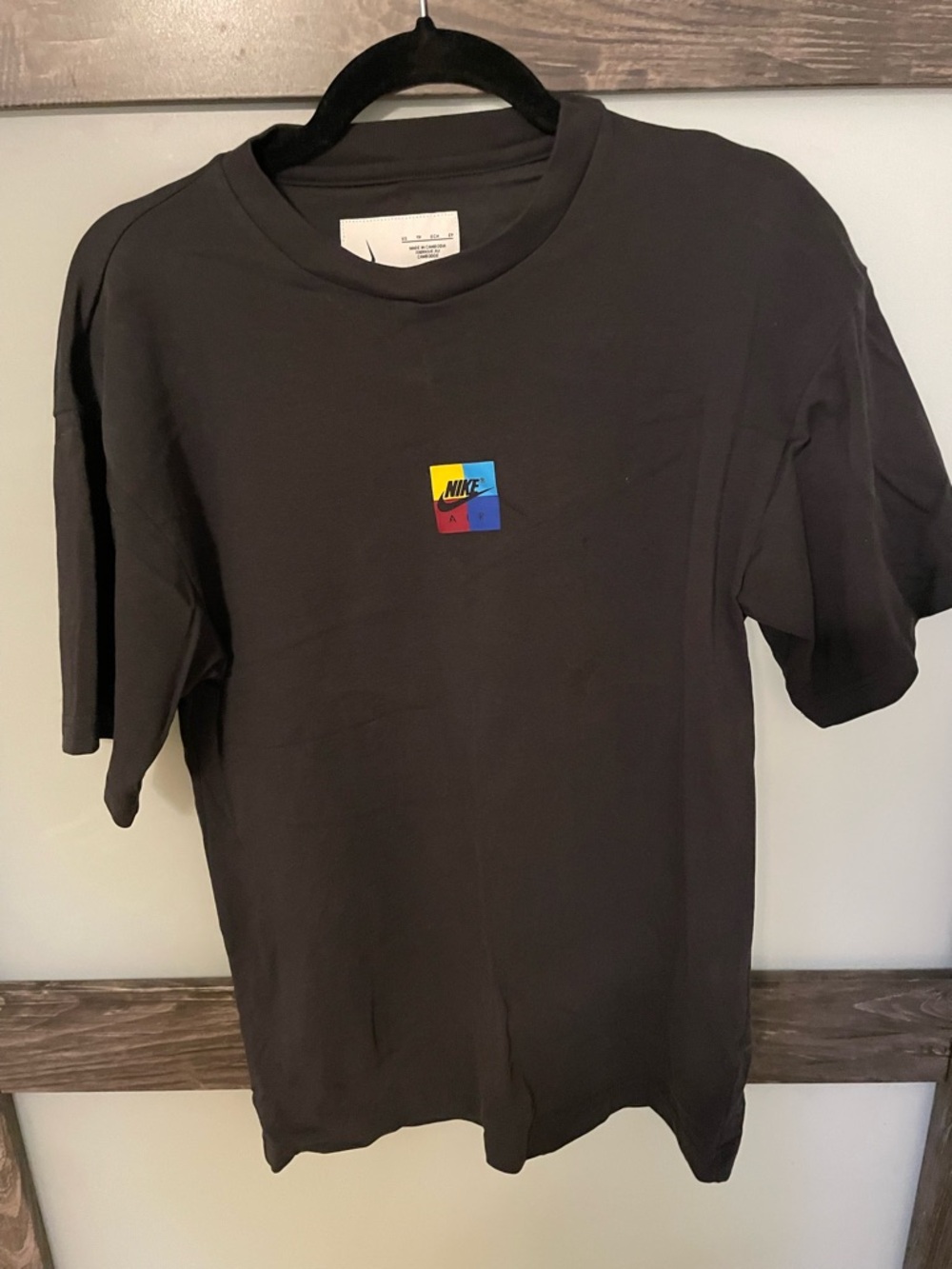 Nike Black Short Sleeve T-Shirt with Small Multicolor Chest Patch